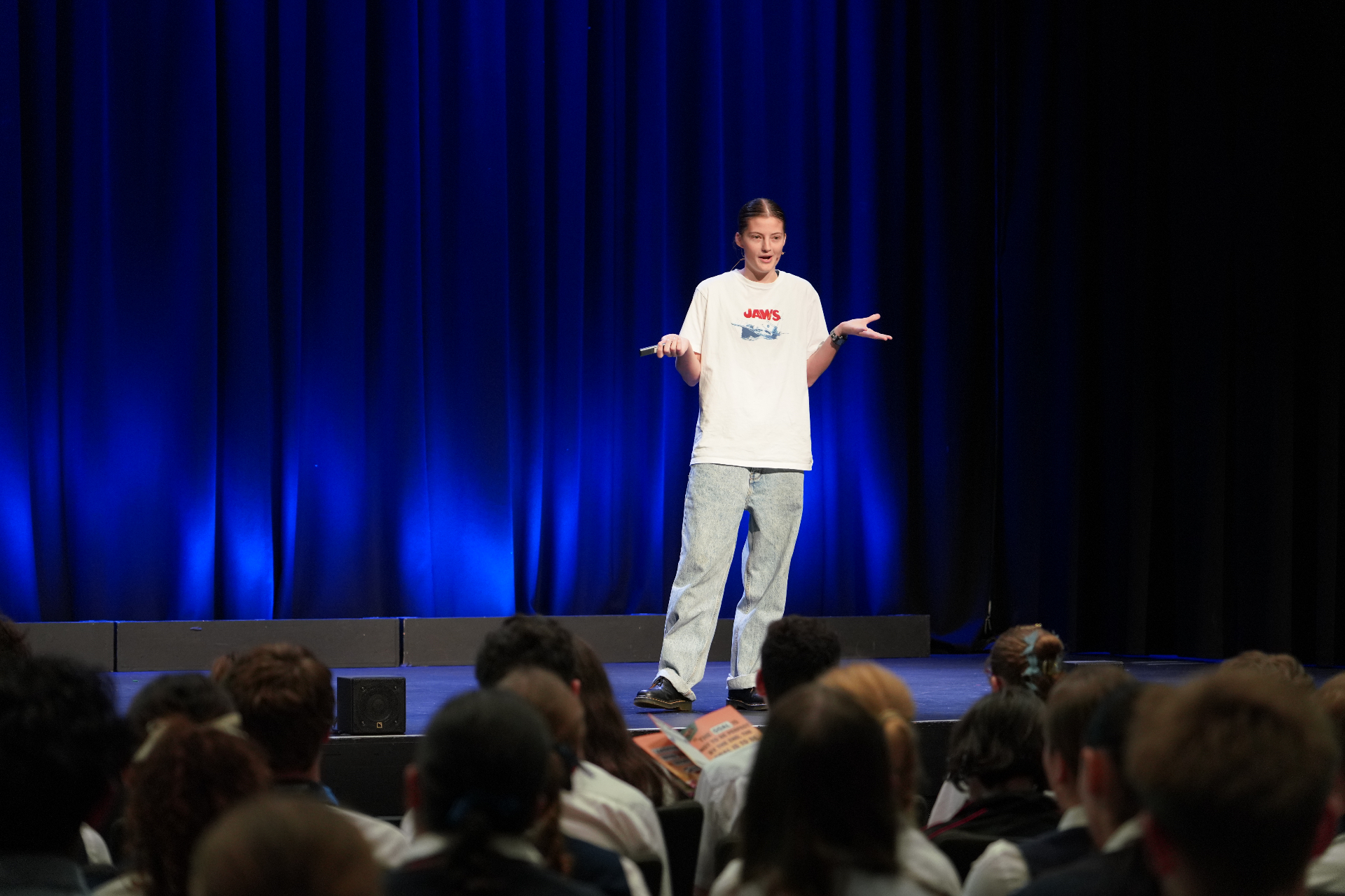 Amity speaking to a student audience